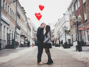 couple-walking-on-city-street-307791