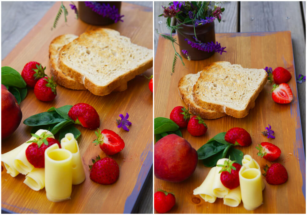 frukostbricka med rostat bröd, ost och jordgubbar